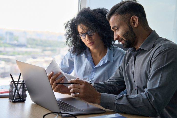 Advisors collaborate on writing a financial advisor job profile​.